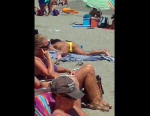 Spotted a lady stroking on a public beach