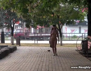 ‪Wednesday ambling bare in public park